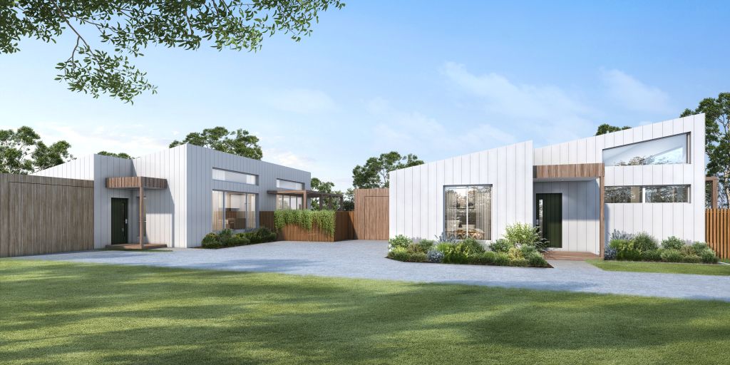 Bridge Street West development - row of modern single-storey townhouses with white cladding, timber accents and landscaped gardens