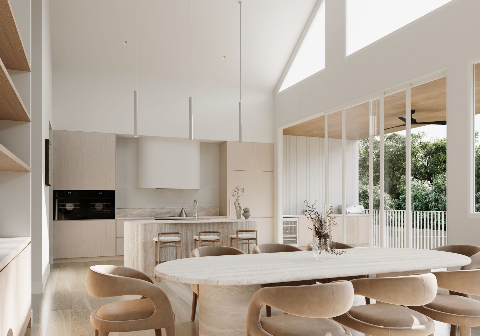 Open-plan kitchen and dining area with oval travertine dining table, curved leather chairs and views to outdoor entertaining area